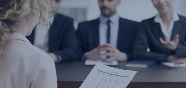 Woman holding her resume